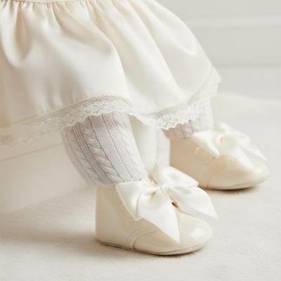 BP073-I  Ivory Patent "Bow" Soft Sole Boot  (0-3)