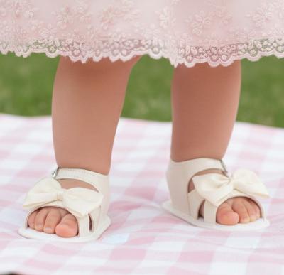BPS050-IP  Patent Ivory Bow Soft Sole Sandal  (0-3)