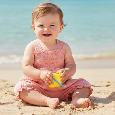 ML2120-6294-P  Shirred "Bows" Muslin Romper  (Newborn - 6 months)