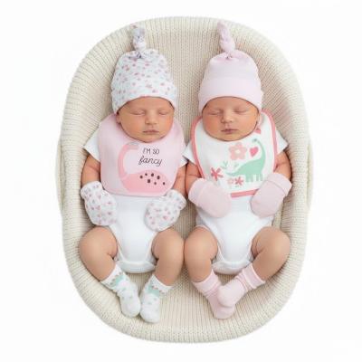NT25-1357P  8 Piece "Dino" Bib, Hat, Mitts and Socks Set  (0-3m)