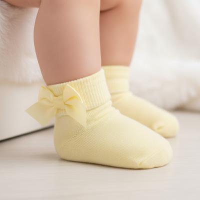 NT61-2223L-0-3  Lemon Yellow Bow Socks  (0-3 months)