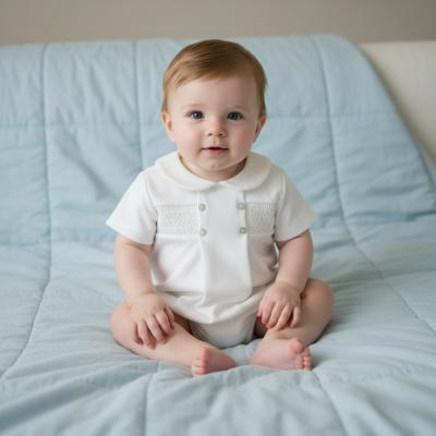 PX04550-I Ivory Smocked Romper (NB-6 months)