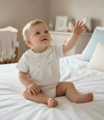 Pex   PX04550I Ivory Smocked Romper (NB-6 months)