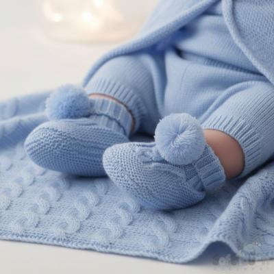STABO12-B  Blue Elegence Cable and Pom Pom Booties  (NB - 12m)