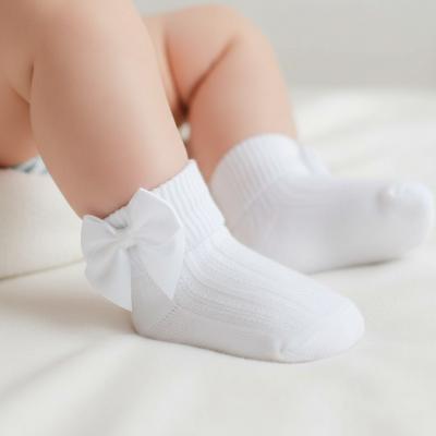 STS123-W-06  White Ribbed With Bow Sock  (0-6 months)