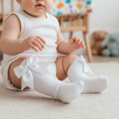 STS350-W-612  Elegance White Bow Sock  (6-12 months)