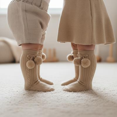 STS355-COF   Elegance Coffee Pom Pom Sock  (0-24 months)