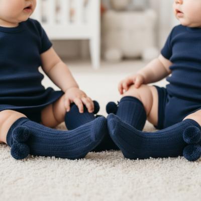 STS355-N  Navy Blue Elegance Pom pom Sock  (0-24 months)