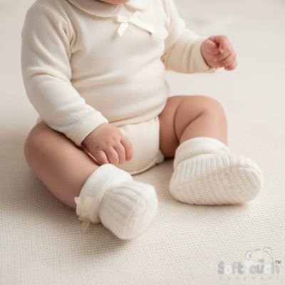 STS450-C  Cream Bow Knit Booties  (newborn +)