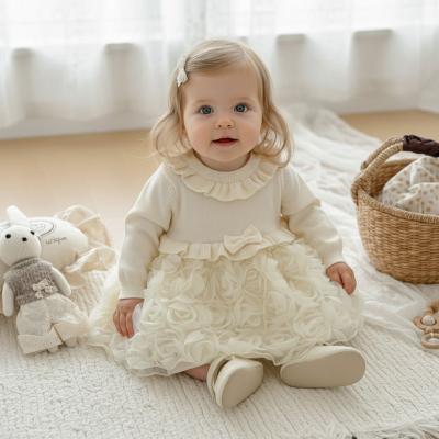 SV26003-I  Ivory Knit and rosette dress  (0-12 months)